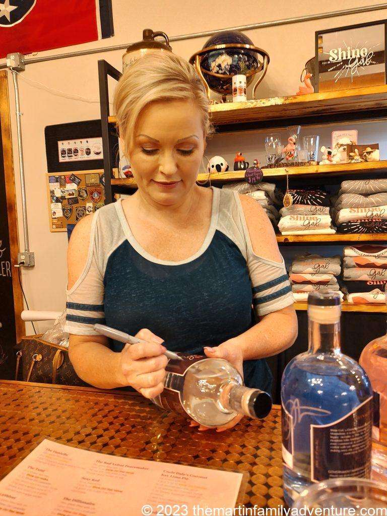 Danielle Parton Autographing Bottles