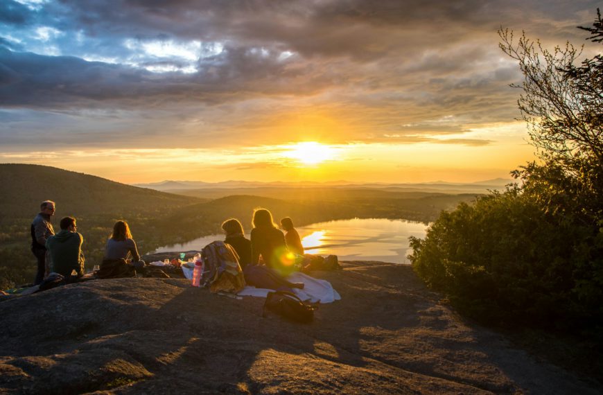 people watching a sunset